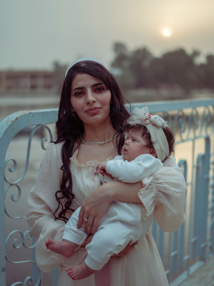 A mother holding her newborn at Medlyn Hospital